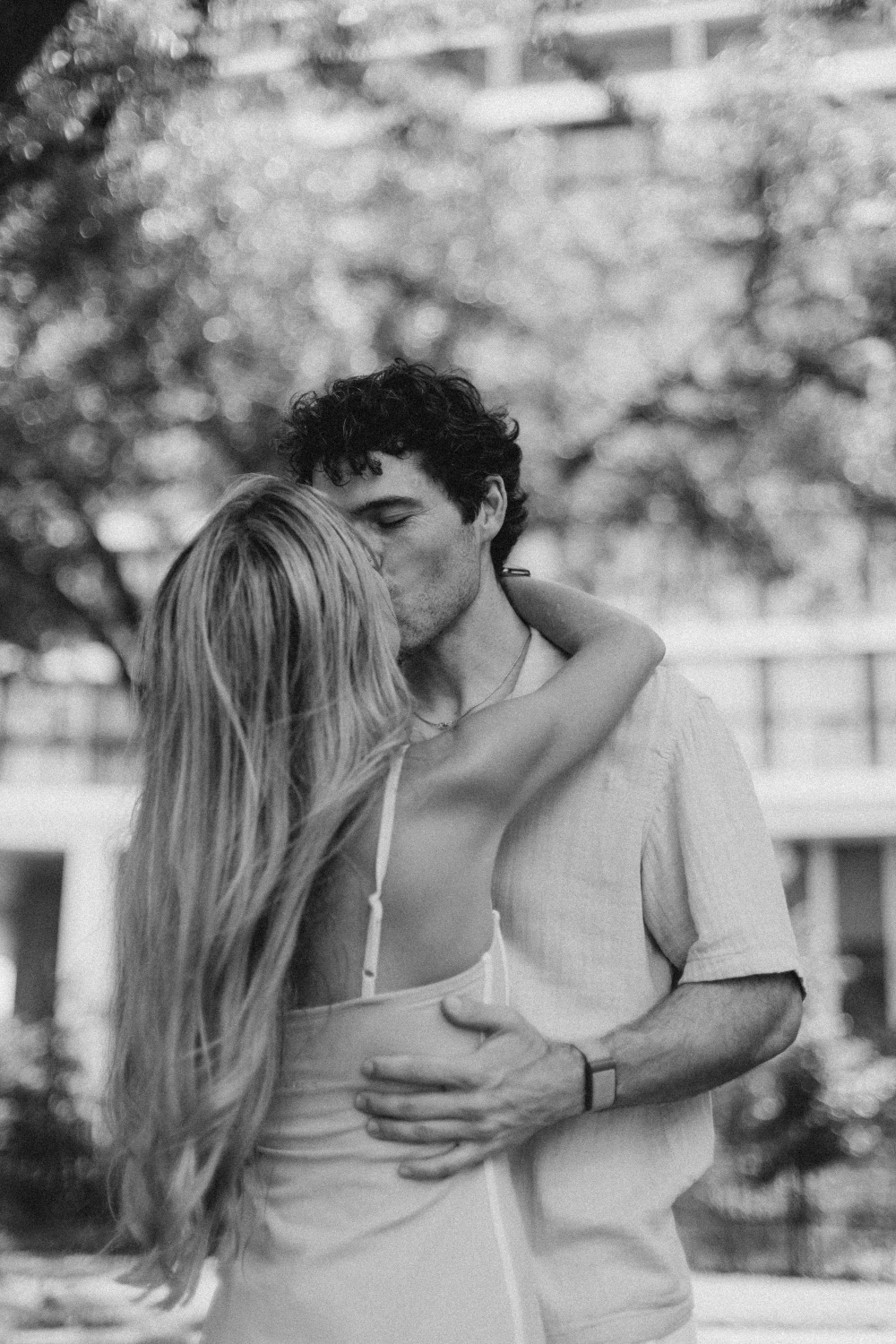 Hunter and Mary embracing, in black and white