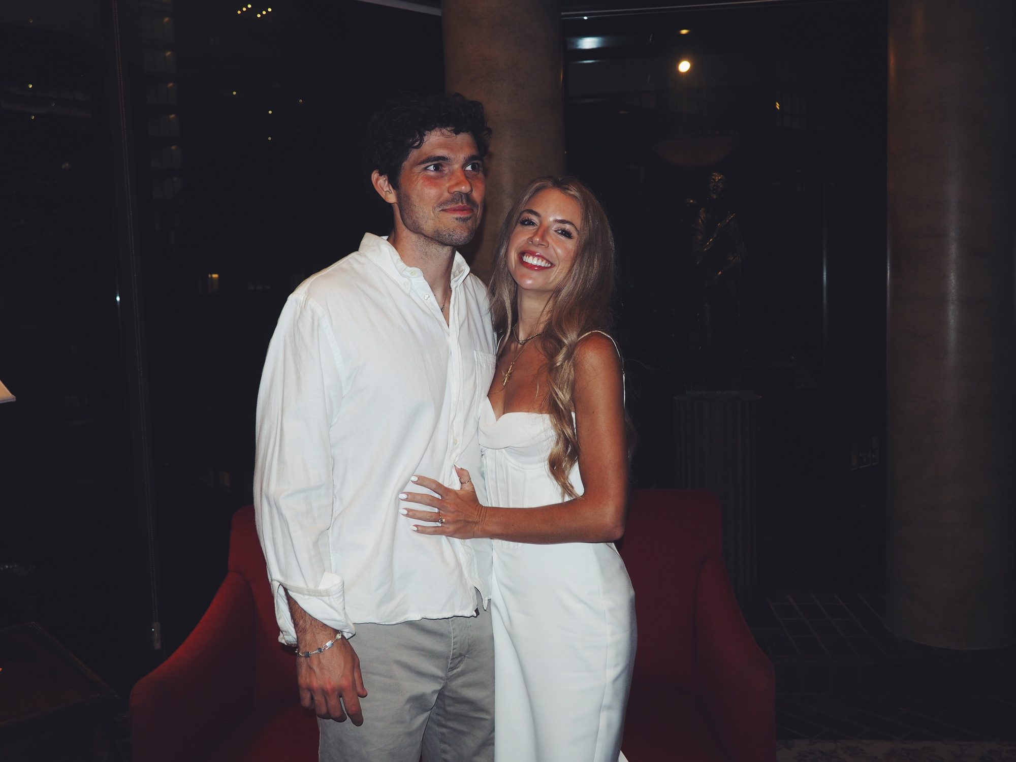 Hunter and Mary smiling together on a night out